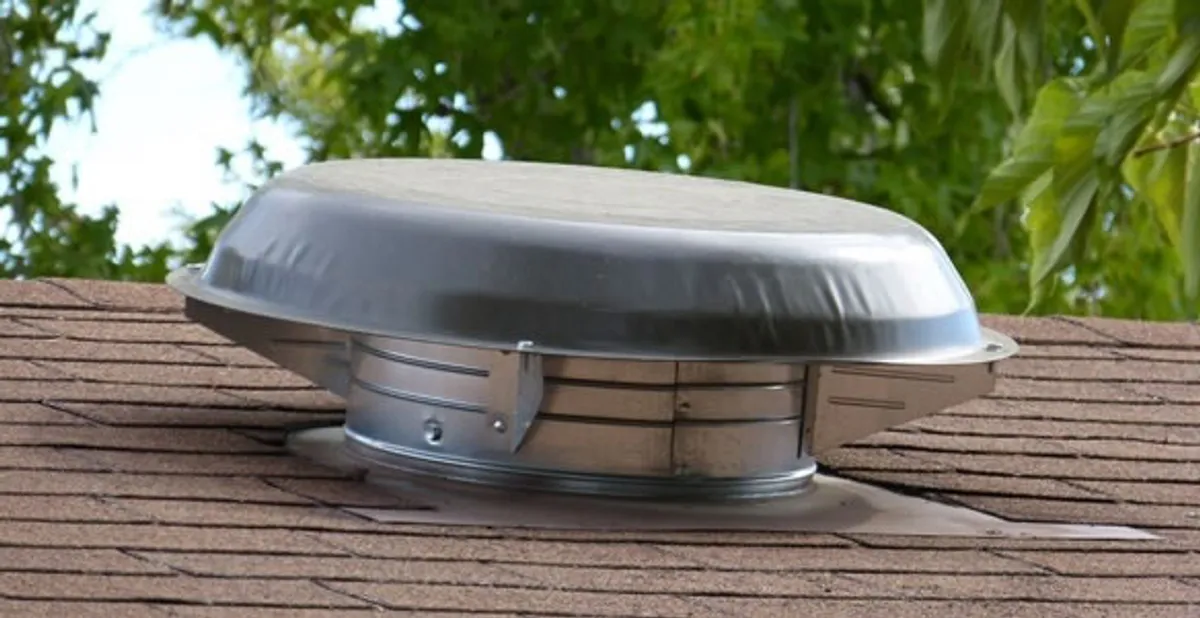 attic fan installation services with low-profile roof ventilation unit in Naperville, IL