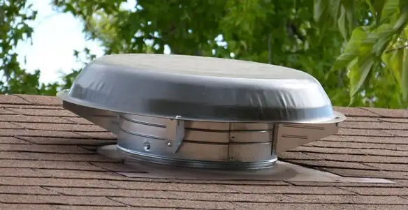 attic fan installation services with low-profile roof ventilation unit in Naperville, IL