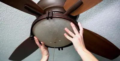 Ceiling fan repair and reinstallation on ceiling mount in Naperville, IL