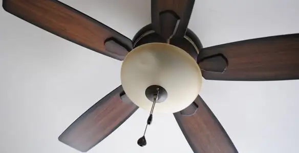 Fully installed ceiling fan with balanced blades and light fixture in Naperville, IL