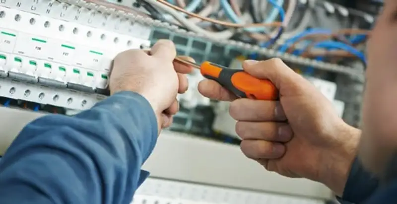 electrical service showing licensed electrician performing electrical panel maintenance and adjustments in Naperville, IL
