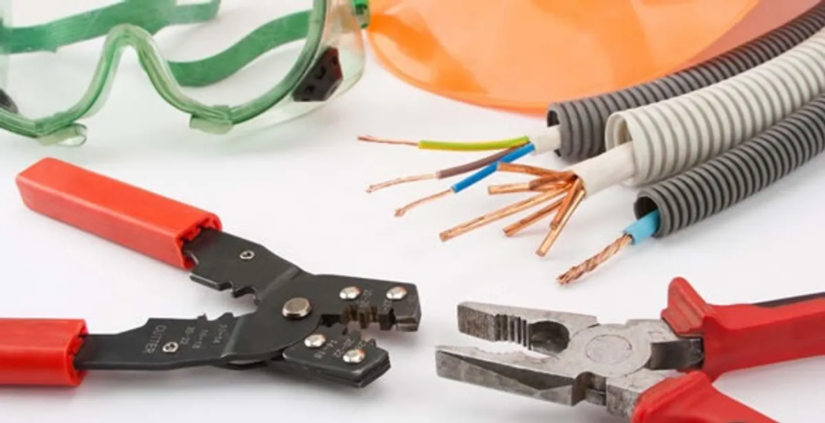 Electrical wiring repair with professional tools and safety equipment in Wheaton, IL