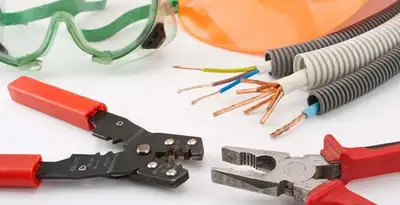 Electrical wiring repair with professional tools and safety equipment in Wheaton, IL