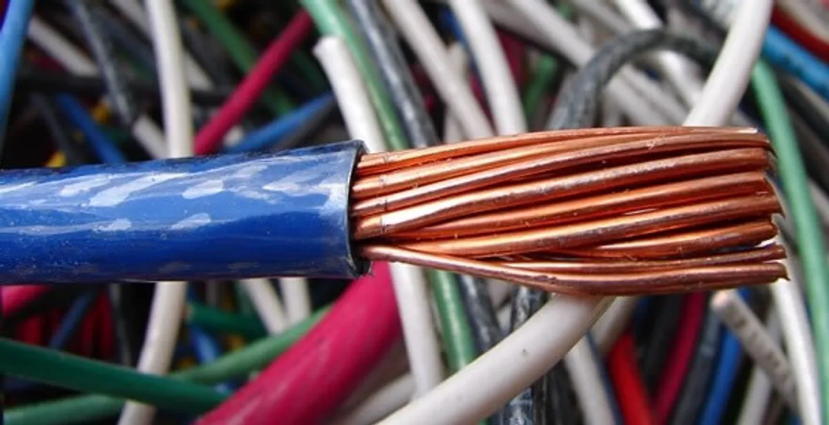 electrical wiring services showing exposed copper conductors and cable preparation in Naperville, IL