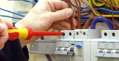 electrician services performing professional electrical panel wiring and connections in Naperville, IL