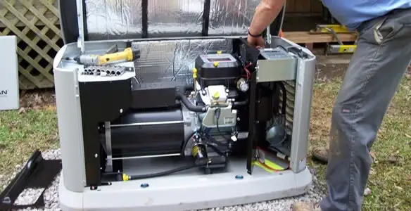 generator installation service showing technician connecting and configuring generator components in Naperville, IL