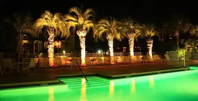 landscape lighting installation services illuminating outdoor recreational areas in Naperville, IL