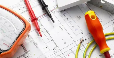 licensed electrician planning and testing electrical systems using professional tools in Naperville, IL