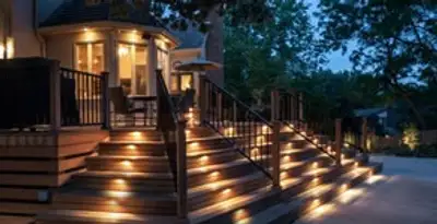 Residential electrician installing outdoor lighting for home safety in Naperville, IL